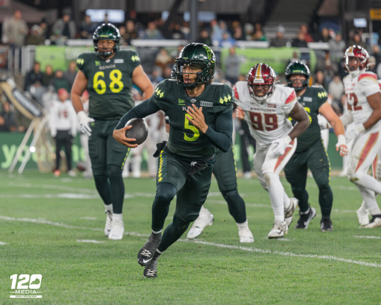 Louisville Kings quarterback Jason Bean (#5) scrambling for yardage against the Birmingham Stallions during the second quarter at Lynn Family Stadium