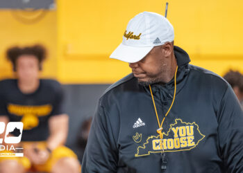Head Coach Dennis Johnson addresses his team at halftime during Woodford County’s 52-12 win over South Oldham at Community Stadium, Versailles, October 3, 2025.