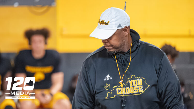 Head Coach Dennis Johnson addresses his team at halftime during Woodford County’s 52-12 win over South Oldham at Community Stadium, Versailles, October 3, 2025.