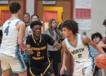 North Oldham's Pierre Rondo Jr. looks for a driving lane during the 8th Region Semifinals.