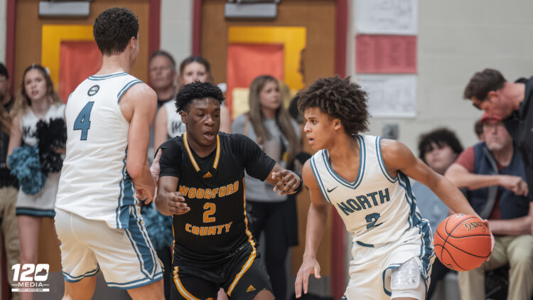 North Oldham's Pierre Rondo Jr. looks for a driving lane during the 8th Region Semifinals.