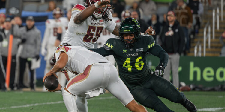 Louisville Kings linebacker Cam Gill (46) attempts to sack Birmingham Stallions quarterback Matt Corral during last week’s home opener.