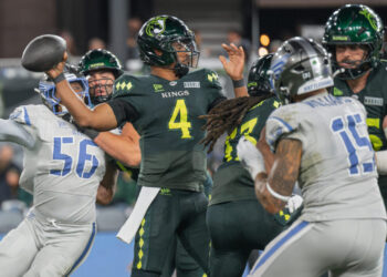 Louisville Kings quarterback Chandler Rogers (4) delivers a pass under pressure against the St. Louis Battlehawks during a UFL game at Lynn Family Stadium in Louisville, KY, Thursday, April 30, 2026.