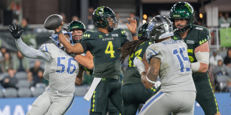 Louisville Kings quarterback Chandler Rogers (4) delivers a pass under pressure against the St. Louis Battlehawks during a UFL game at Lynn Family Stadium in Louisville, KY, Thursday, April 30, 2026.